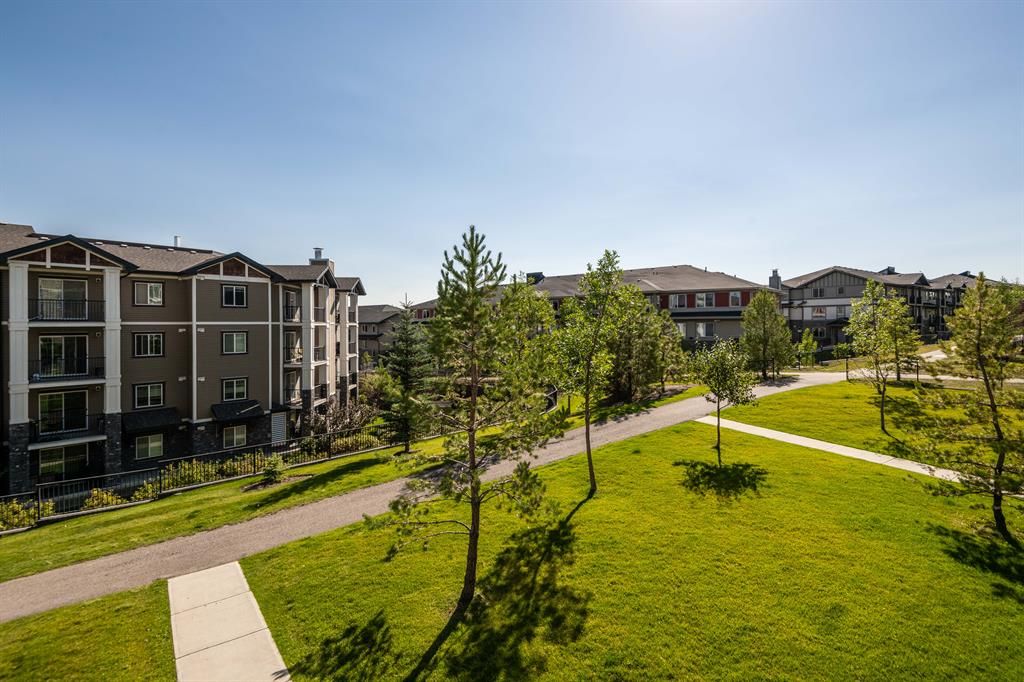 Main Photo: 2207 130 Panatella Street NW in Calgary: Panorama Hills Apartment for sale : MLS®# A2000512