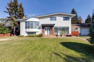 Photo 1: 2432 58 Avenue SW in Calgary: North Glenmore Park Detached for sale : MLS®# A2003437