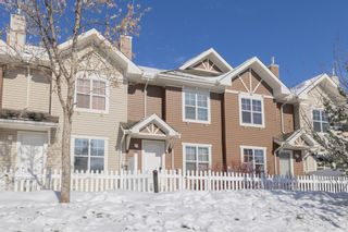Photo 1: 321 Toscana Gardens NW in Calgary: Tuscany Row/Townhouse for sale : MLS®# A2029043