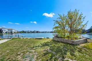 Photo 4: 151 Coral Shores Landing NE in Calgary: Coral Springs Detached for sale : MLS®# A2080881