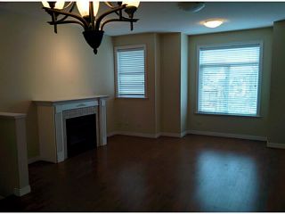 Photo 3: 5 8655 159TH Street in Surrey: Fleetwood Tynehead Townhouse for sale in "SPRINGFIELD COURT" : MLS®# F1406166
