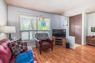 Photo 11: 633 Queensland Place SE in Calgary: Queensland Row/Townhouse for sale : MLS®# A2048628