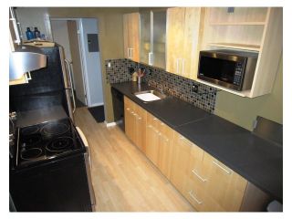 Photo 3: # 107 2424 CYPRESS ST in Vancouver: Kitsilano Condo for sale in "CYPRESS GARDENS" (Vancouver West)  : MLS®# V975899