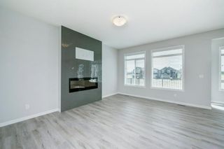 Photo 5: 89 Creekside Way SW in Calgary: C-168 Detached for sale : MLS®# A1013282
