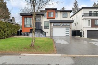 Photo 1: 8995 QUEEN MARY Boulevard in Surrey: Queen Mary Park Surrey House for sale : MLS®# R2859019