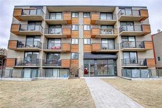 Main Photo: 207 916 Memorial Drive NW in Calgary: Sunnyside Apartment for sale : MLS®# A2111591