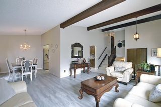 Photo 5: 335 Queensland Place SE in Calgary: Queensland Detached for sale : MLS®# A1137041