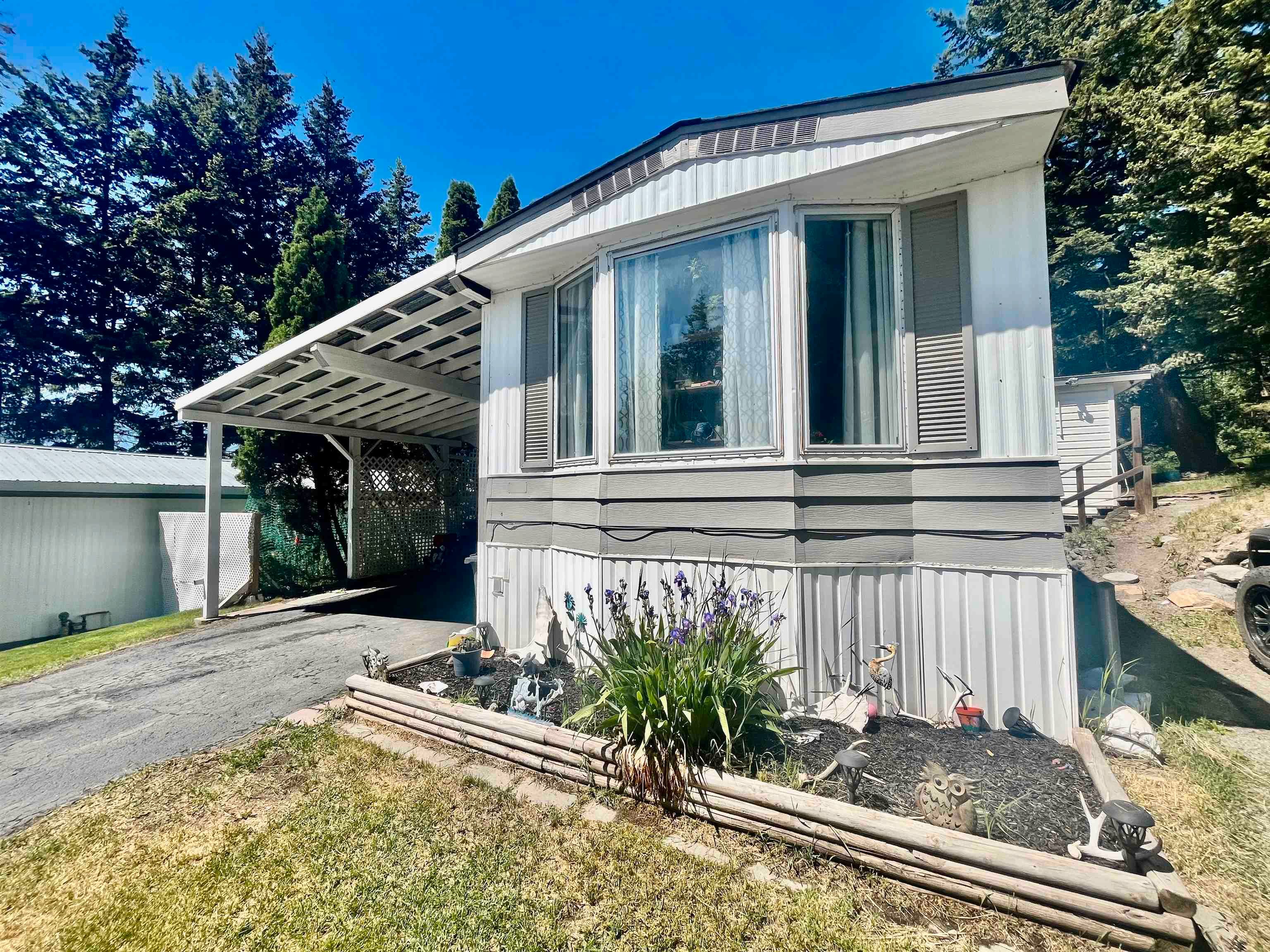 Main Photo: 49 770 N ELEVENTH Avenue in Williams Lake: Williams Lake - City Manufactured Home for sale in "FRAN LESS MANUFACTURED HOME PARK" : MLS®# R2786498