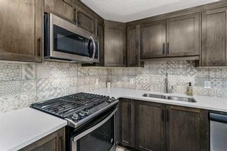 Photo 9: 907 Cranbrook Walk SE in Calgary: Cranston Row/Townhouse for sale : MLS®# A2125451
