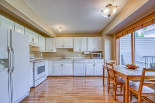 Photo 7: 5475 Patina Drive SW in Calgary: Patterson Row/Townhouse for sale : MLS®# A1220360