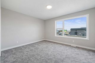 Photo 12: 84 Belmont Green SW in Calgary: Belmont Detached for sale : MLS®# A2095377