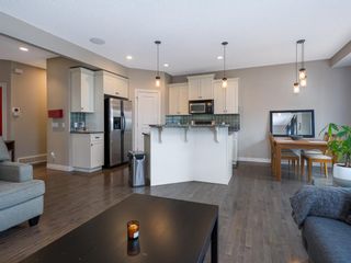 Photo 5: 27 Cougar Plateau Way SW in Calgary: Cougar Ridge Detached for sale : MLS®# A1113604