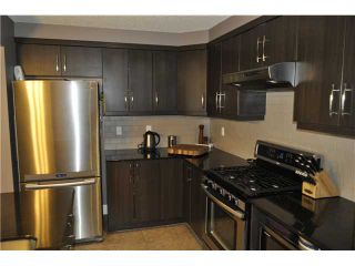 Photo 13: 7 WINDSTONE Green SW: Airdrie Residential Attached for sale : MLS®# C3638273