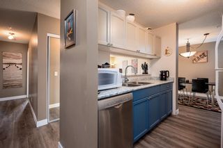 Photo 2: 103 55 Arbour Grove Close NW in Calgary: Arbour Lake Apartment for sale : MLS®# A2029692