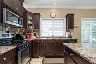 Photo 12: 16 6498 SOUTHDOWNE Place in Sardis: Sardis South Townhouse for sale in "Village Green" : MLS®# R2756967