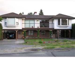 Photo 1: 6212 CLINTON Street in Burnaby: South Slope Duplex for sale in "South Slope" (Burnaby South)  : MLS®# V652997