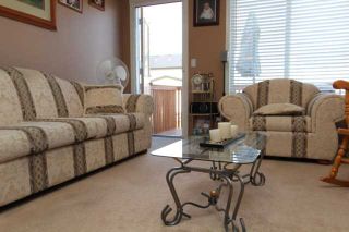 Photo 2: 543 STONEGATE Way NW: Airdrie Residential Attached for sale : MLS®# C3580927