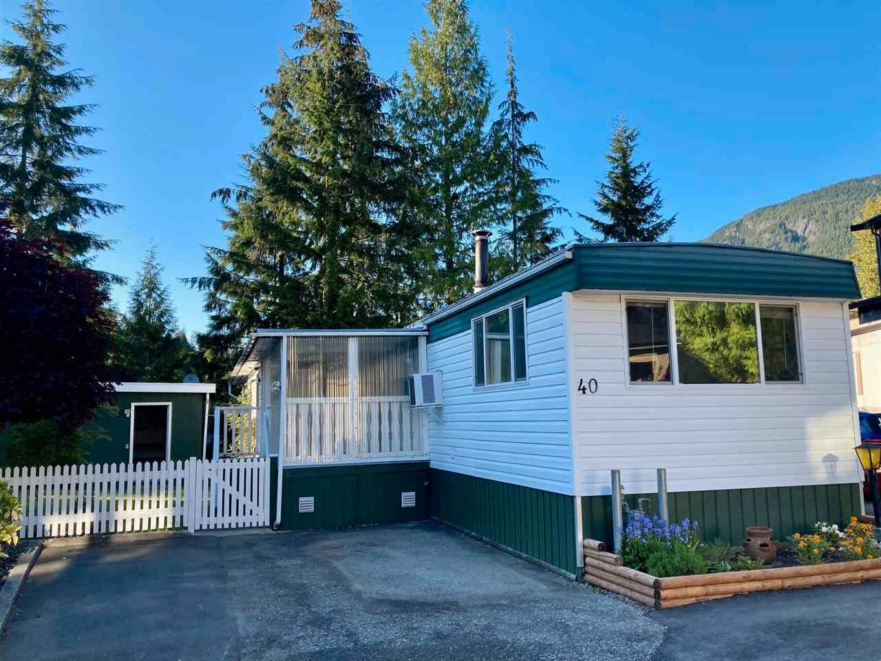 Main Photo: 40 3295 SUNNYSIDE Road: Anmore Manufactured Home for sale in "COUNTRYSIDE VILLGE" (Port Moody)  : MLS®# R2580557