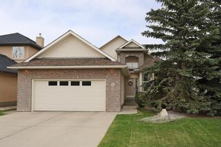 Photo 1: 12 Strathridge Way SW in Calgary: Strathcona Park Detached for sale : MLS®# A2046710