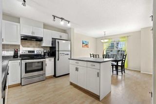 Photo 5: 105 Elgin Gardens SE in Calgary: McKenzie Towne Row/Townhouse for sale : MLS®# A2060511