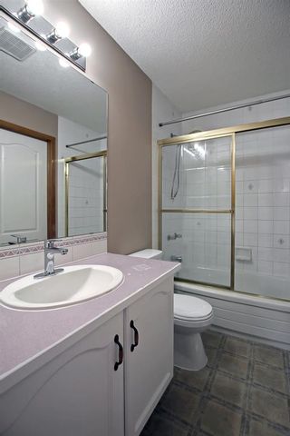 Photo 18: 240 erin meadow Green in Calgary: Erin Woods Detached for sale : MLS®# A2003999
