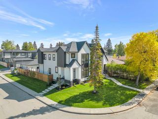 Main Photo: 4215 35 Avenue SW in Calgary: Glenbrook Semi Detached (Half Duplex) for sale : MLS®# A2080778