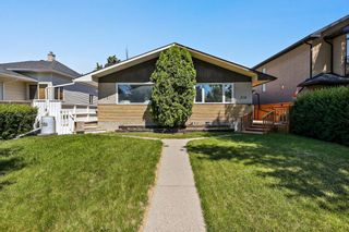Photo 1: 718 21 Avenue NW in Calgary: Mount Pleasant Semi Detached (Half Duplex) for sale : MLS®# A1243772