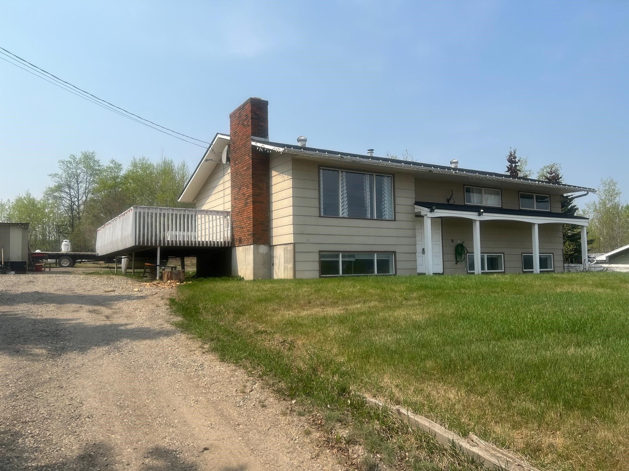 Main Photo: 13067 LAKESHORE Drive in Charlie Lake: Lakeshore House for sale in "CHARLIE LAKE" (Fort St. John)  : MLS®# R2752161