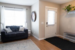 Photo 2: 199 Fireside Parkway: Cochrane Row/Townhouse for sale : MLS®# A1238005