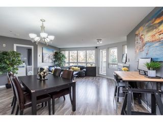 Photo 1: A306 2099 LOUGHEED Highway in Port Coquitlam: Glenwood PQ Condo for sale in "Shaughnessy Square" : MLS®# R2637770