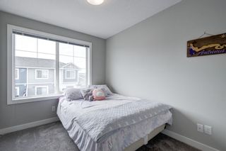 Photo 16: 2501 Jumping Pound Common: Cochrane Row/Townhouse for sale : MLS®# A1232426
