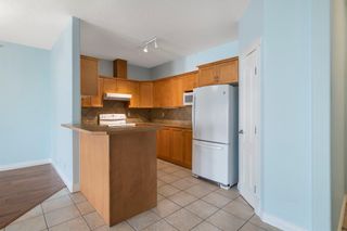 Photo 10: 319 248 Sunterra Ridge Place: Cochrane Apartment for sale : MLS®# A2004149