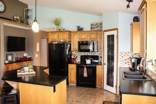 Photo 9: 27 HILLVIEW Road: Strathmore Semi Detached for sale : MLS®# A1227065
