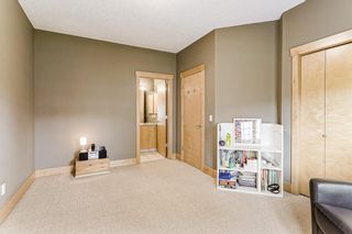 Photo 29: 17 Somme Boulevard SW in Calgary: Garrison Woods Row/Townhouse for sale : MLS®# A2037645