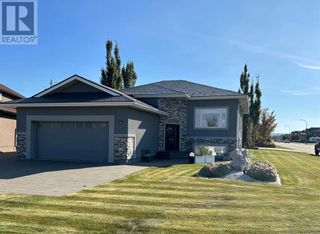 Photo 1: 321 13 Street SE in Slave Lake: House for sale : MLS®# A2115636