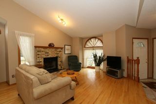 Photo 7: 2 WEST ANDISON Close: Cochrane House for sale : MLS®# C4141938