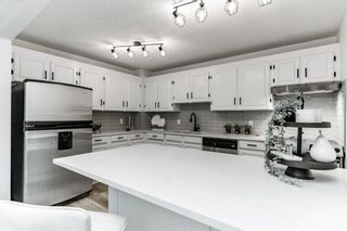 Photo 9: 4 205 12 Street NW in Calgary: Hillhurst Row/Townhouse for sale : MLS®# A1221859