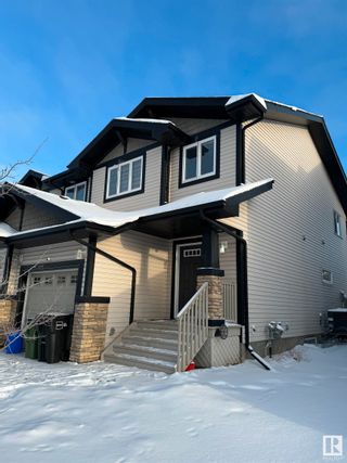 Photo 1: 9911 217 Street in Edmonton: Zone 58 House Half Duplex for sale : MLS®# E4368087