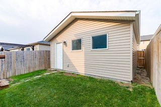 Photo 47: 1072 Kings Heights Road SE: Airdrie Semi Detached (Half Duplex) for sale : MLS®# A1257434