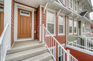 Photo 2: 422 Cranford Mews SE in Calgary: Cranston Row/Townhouse for sale : MLS®# A1154308