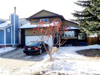Photo 2: 13903 DEER RUN Boulevard SE in Calgary: Deer Run House for sale : MLS®# C4048969