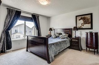 Photo 18: 28 Cougarstone Square SW in Calgary: Cougar Ridge Detached for sale : MLS®# A1099416
