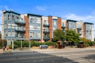 Photo 1: 404 20277 53 Avenue in Langley: Langley City Condo for sale in "METRO II" : MLS®# R2729189