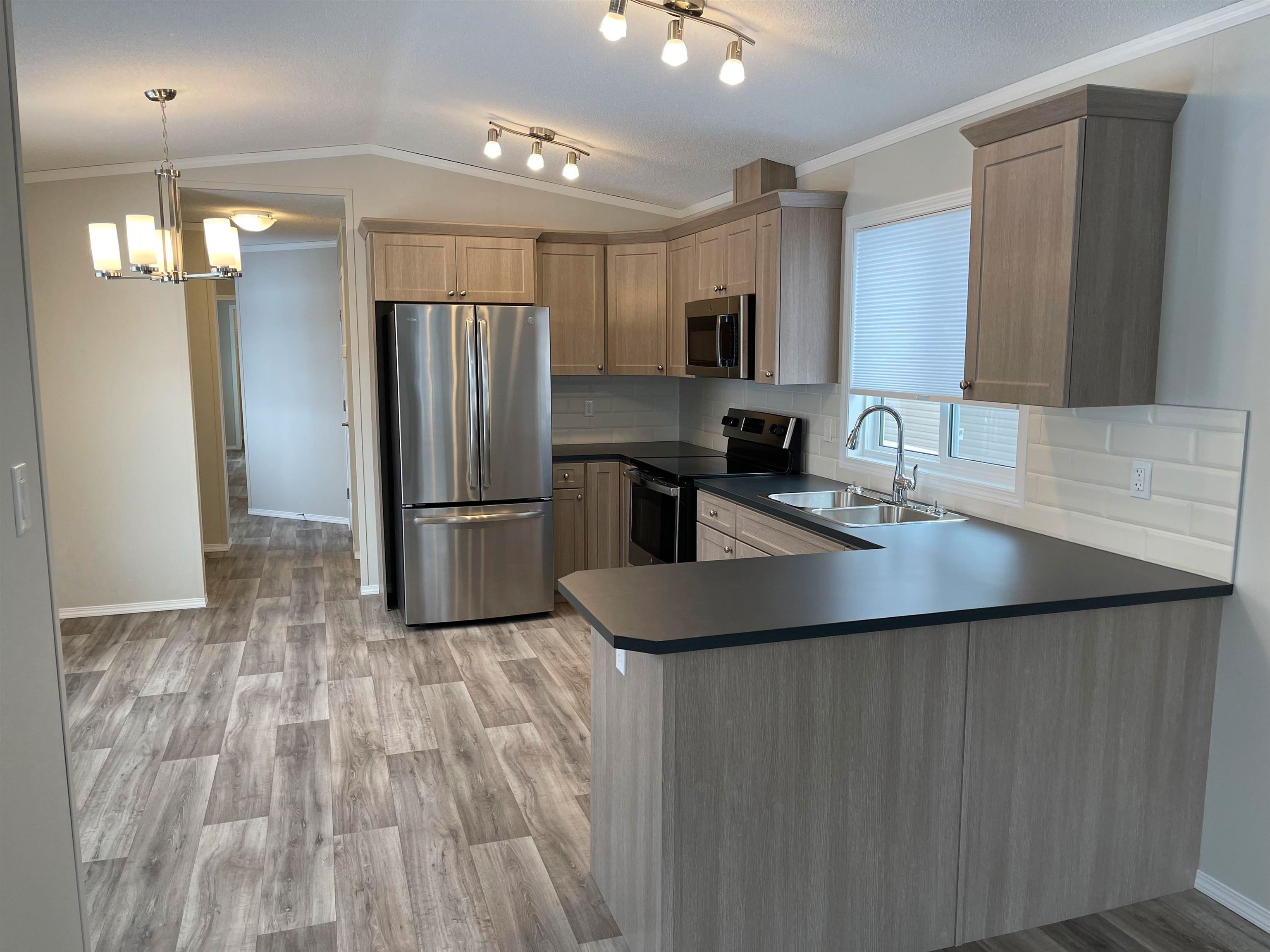 Photo 4: Photos: 50 5164 HART Highway in Prince George: Hart Highway Manufactured Home for sale in "NORTH PARK HEIGHTS" (PG City North (Zone 73))  : MLS®# R2632432