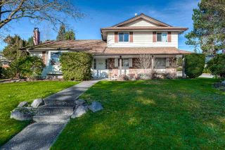 Photo 1: 7129 BUFFALO Street in Burnaby: Government Road House for sale (Burnaby North)  : MLS®# R2032643