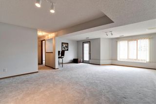 Photo 18: 120 Edgepark Villas NW in Calgary: Edgemont Semi Detached for sale : MLS®# A1199464