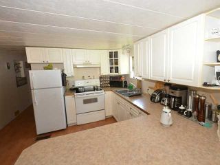 Photo 5: 37 201 CAYER Street in Coquitlam: Maillardville Manufactured Home for sale in "WILDWOOD PARK" : MLS®# V972709