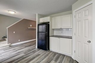 Photo 6: 9 Sandarac Way NW in Calgary: Sandstone Valley Row/Townhouse for sale : MLS®# A2050563