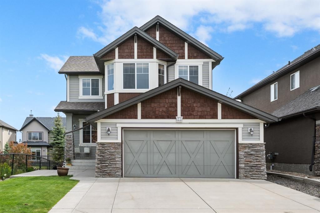 Main Photo: 51 Tremblant Point SW in Calgary: Springbank Hill Detached for sale : MLS®# A1230453