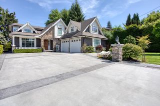 Photo 1: 965 MACINTOSH Street in Coquitlam: Harbour Chines House for sale : MLS®# R2780227